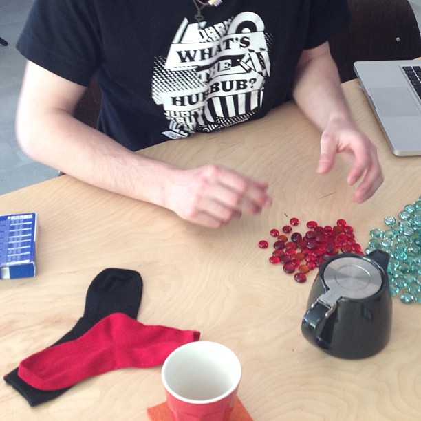 Tim prepping for a KAIGARA playtest. Yes, those are tiny socks. #latergram